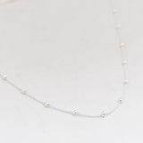 Ketting balletjes verspreid