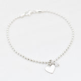 Armband bolletjes bedel