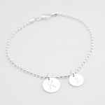 armband letter bedel twee rondels