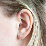 Ear cuff gekruist
