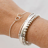 Armband twee cirkels twist